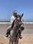 Mädchen reitet auf Pferd am Strand - Marokko Family & Teens