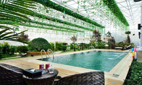 Pool Jinpeng Eco Hotel - China Reise mit Kindern