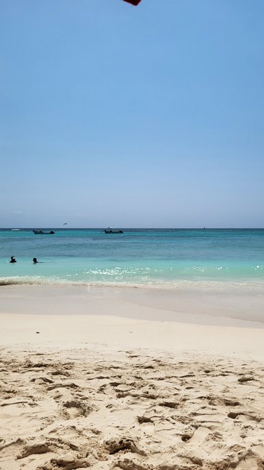 Türkisblaues Meer und feiner Sandstrand in Playa del Carmen – Mexiko Familienreise