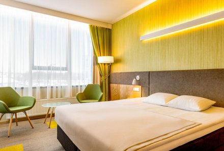 Baltikum for family individuell - Baltikum Familienreise - Hotel Tartu - Bett