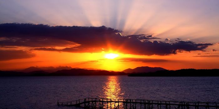 Kofferpacken für den Familienurlaub - Sonnenuntergang am Strand