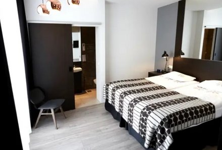 Island for family individuell - Fosshotel Raudara -  Schlafzimmer im Design Room