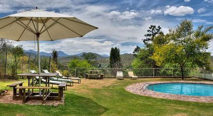 Familienreise Südafrika - Best of Garden Route for family - Oudtshoorn Berluda Farmhouse & Cottages - Pool