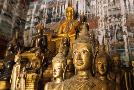 Laos und Vietnam Familienreise - Laos und Vietnam Reise mit Kindern - Pak Ou-Höhlen Luang Prabang Buddha-Figuren