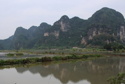 Laos und Vietnam Familienreise - Laos und Vietnam Reise mit Kindern - Trockene Halong-Bucht Landschaft