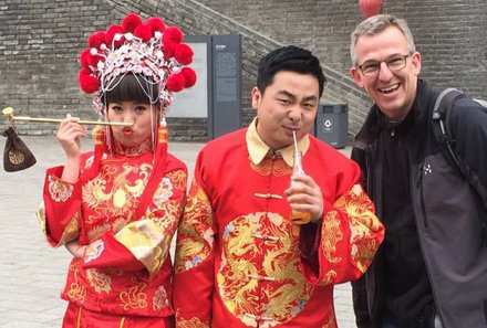 China Familienreise - China mit Kindern - Traditionell gekleidete Einheimische