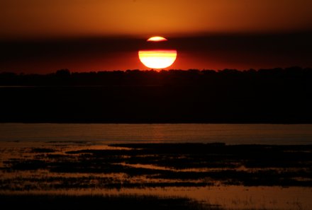 Namibia Familenreise im Mietwagen - Sonnenuntergang in Botswana