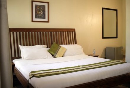 Uganda Familienreise - Uganda Family & Teens - Palm Hotel Bett