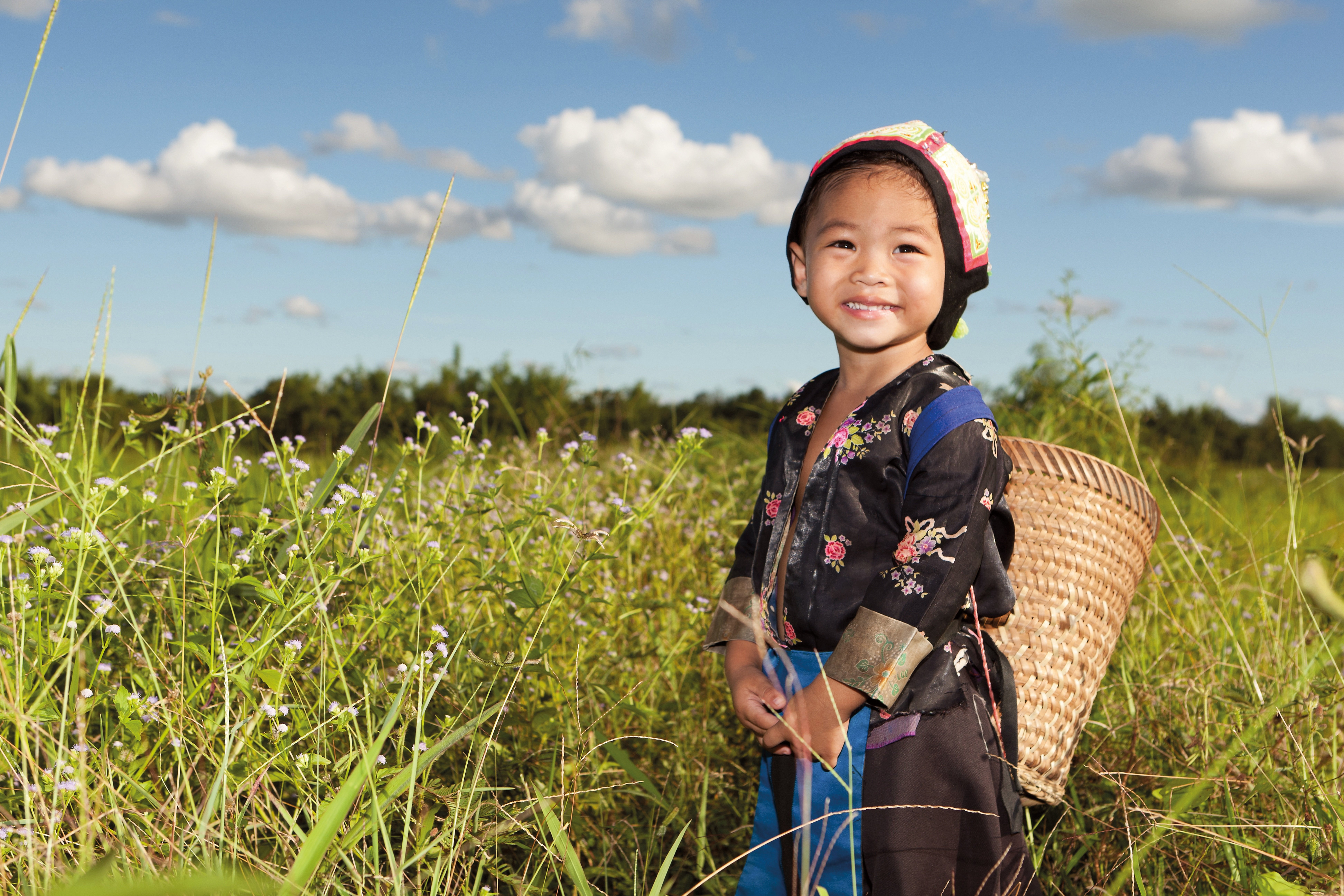 China mit Kindern - Mädchen in Reisfeld