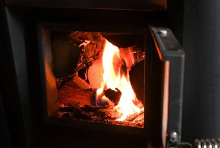 Schweden for family Winter - Wildact Husky Farm - Kamin